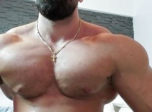 massive chest hunk flexing and shoot big load