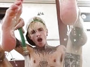 FTM twink fucks boypussy outside with water hose (slow mo)