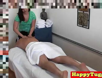 Masseuse jerks his penis with her tender hands