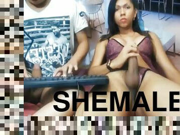 Talented young Colombian shemale and her boyfriend masturbate