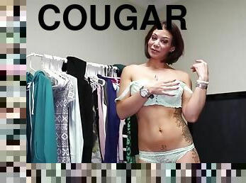 Tattooed cougar showing handjob skills