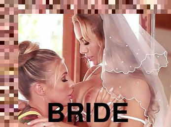 Glamorous bride having fun with her best friend before wedding