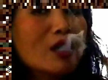 Asian babe smoking and talking