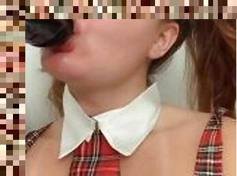 Slutty schoolgirl sucking BBC dildo