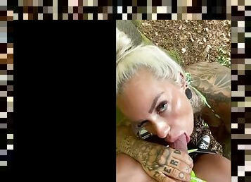 Tattooed babe gets fucked in the woods