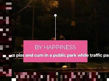 She drinks piss and cum in a public park while traffic passes