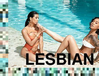 Veronica Rodriguez and Honey Gold in lesbian poolside sex scene