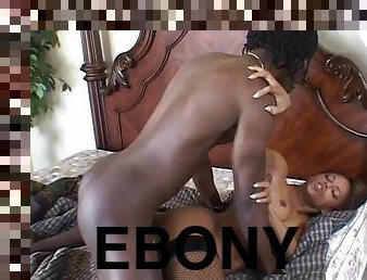 Horny ebony slut takes a huge BBC in both of her holes