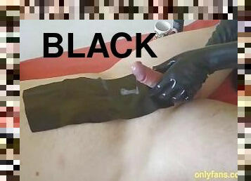 Milking the cock with my long black latex gloves until his balls are empty