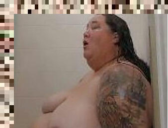 SSBBW sits down to masturbate in the shower