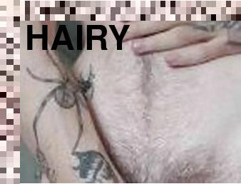 Hairy stomach and pube close-up