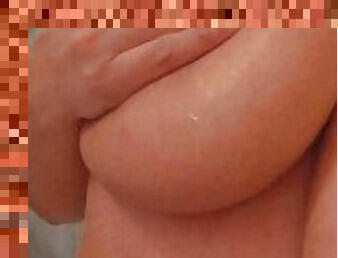 Latina babe with big tits takes a nice bath