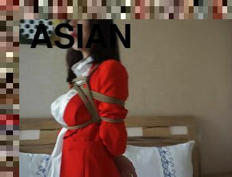 Asian In Red Suit Bound And Gagged
