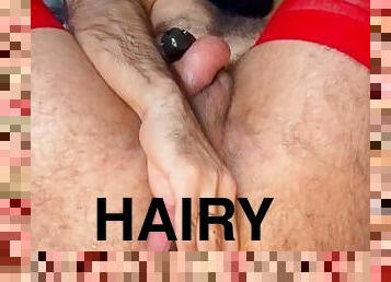 Hairy pussyboy playing with dildo