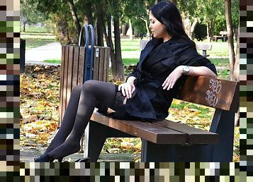 Irresistible Diana exposing her stockinged feet in a park