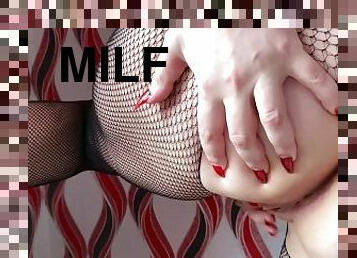 Big ass MILF in sexy fishnet masturbates and squirts