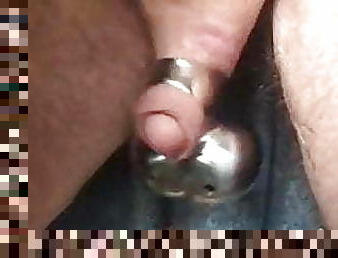 Scrotum chastity in slow motion ball swing