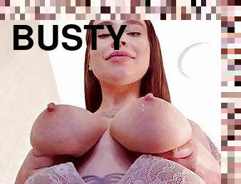 Cute busty Amina sucks her erect nipples again