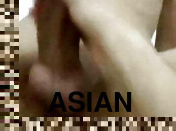 Asian guy with huge cock shoots cum