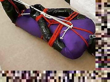 Kirsty rope hogtied, hooded and ballgagged securely