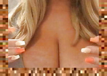 MILF blonde showing her huge boobs
