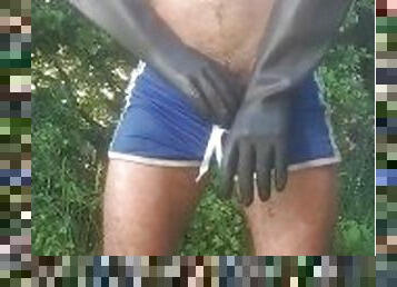 Uncut farm lad in blue shorts pissing