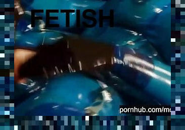 Heavy rubber goddess with big tits in transparent blue latex catsuit and mask masturbates - part 5