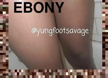 Ebony shows off body and pretty feet in shower
