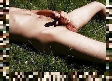 lying naked in the grass while step-mother nature helped me jerk off like its nothing