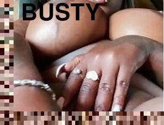 Busty black teen plays with pussy
