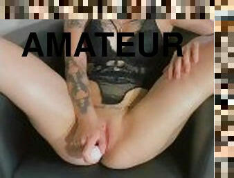 Tattoo girl play with vibrator