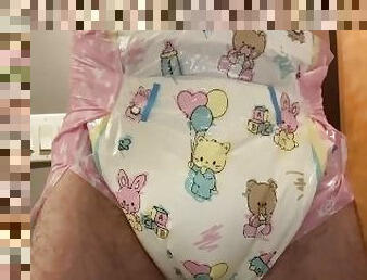 Diaper boy pees in a cute abdl diaper