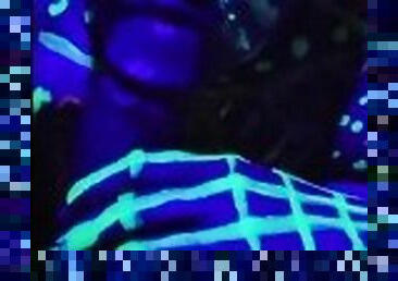 Teasing blacklight blowjob