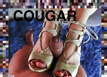 Cougar in stilettos seduces man and gives him a footjob