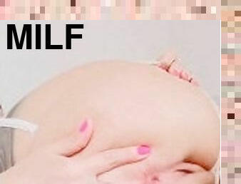 Hot milf caresses her holes