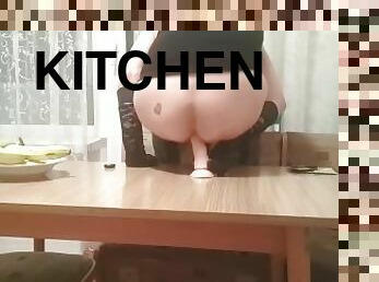 In the kitchen on the table