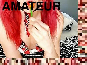 Redhead Schoolgirl Enjoying a Lollipop