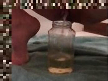 Squatting in front of the mirror to piss in a glass jar (fan request)/ piss fetish