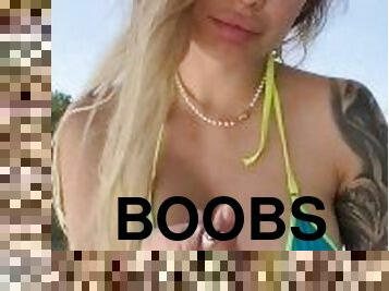 slut with big boobs smokes a sexy cigarette