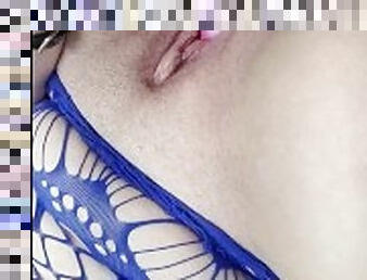 Milf masturbates with vibrator in blue fishnets