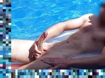 Powerful slow motion cumshot in the pool
