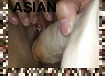 My Asian Filipino wife plays with a big dildo