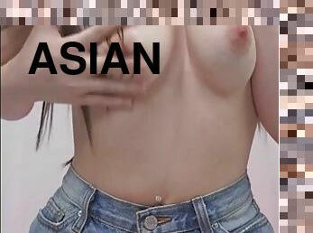 Sexy Asian babe squirts with dildo in pussy