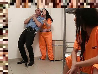 Two naughty inmates with big naturals drag guard into cell and their cunts