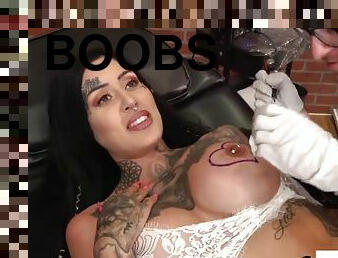 Beautiful babe Janey Doe has her big boobs tattooed - Kinky pornstar
