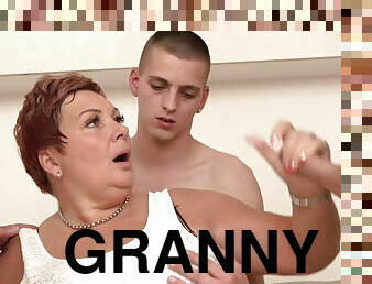 Full redhead granny munching on prick while slit fingered