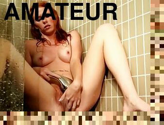 Redhead masturbates in the shower of wf