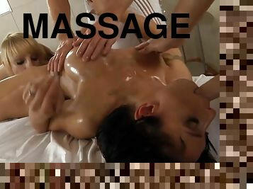 SIX HANDED MASSAGE for busty oiled up brunette MILF with fake tits
