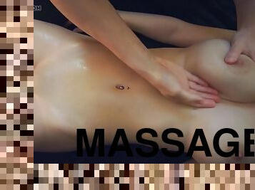 Oil massage for a busty teen