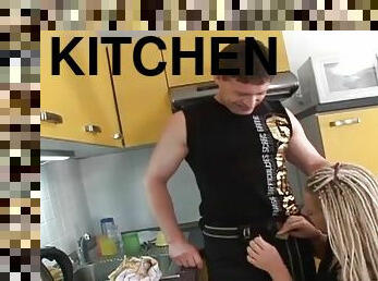 Girl sucks his cock in the kitchen